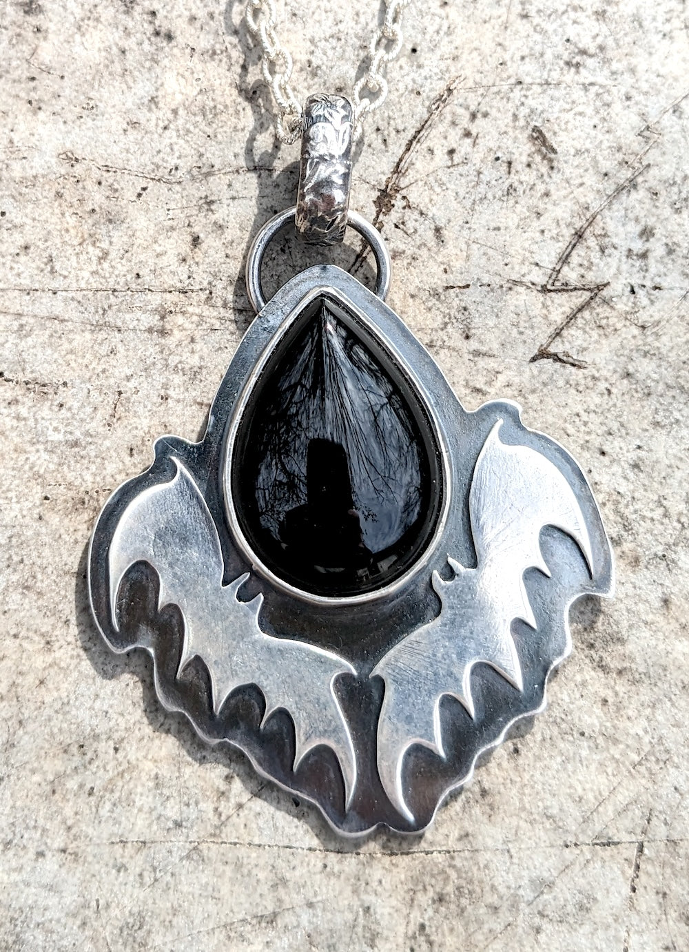 Onyx teardrop and bats pendant