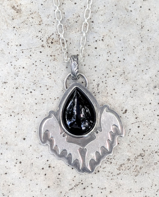 Onyx teardrop and bats pendant