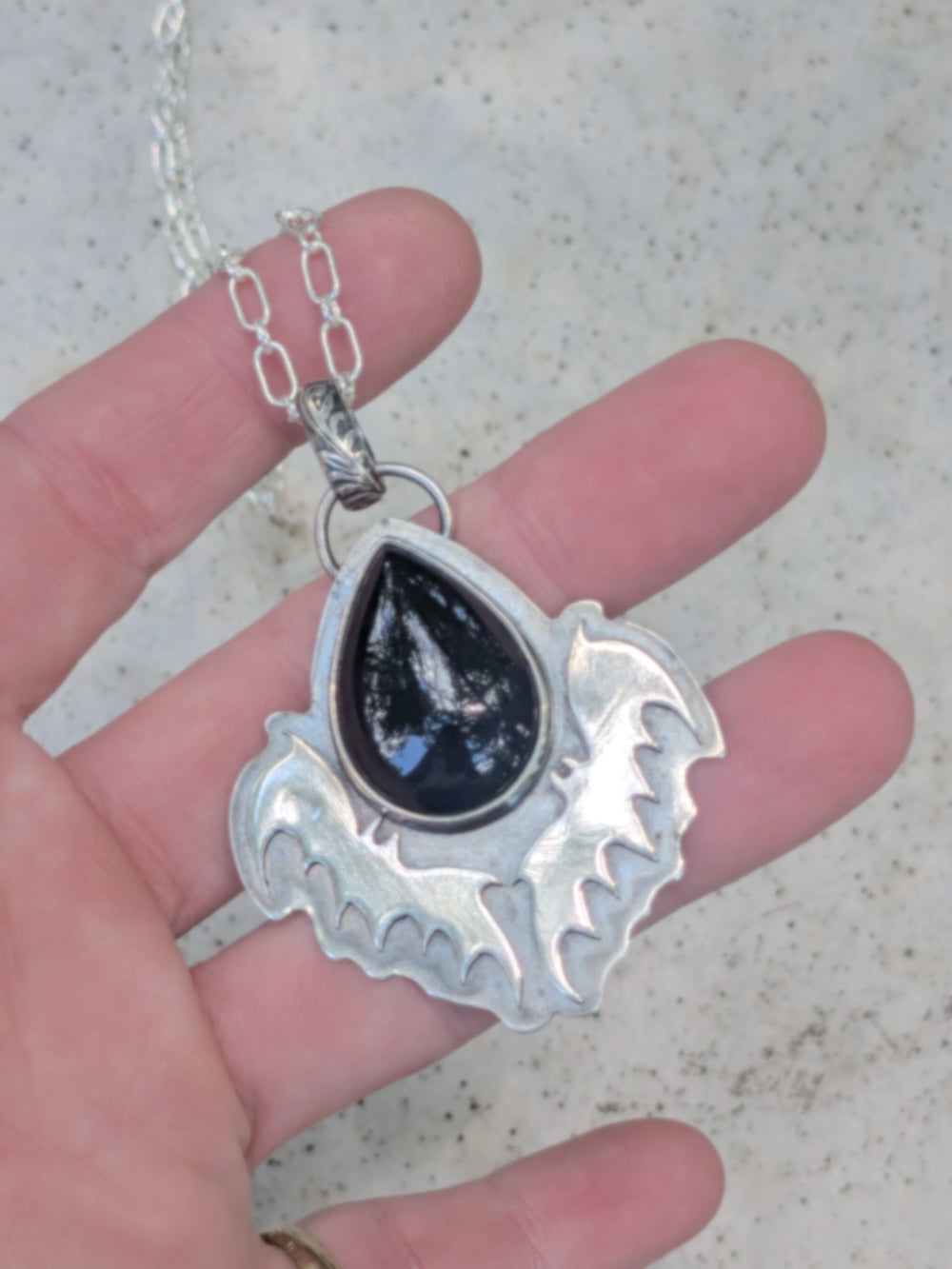 Onyx teardrop and bats pendant