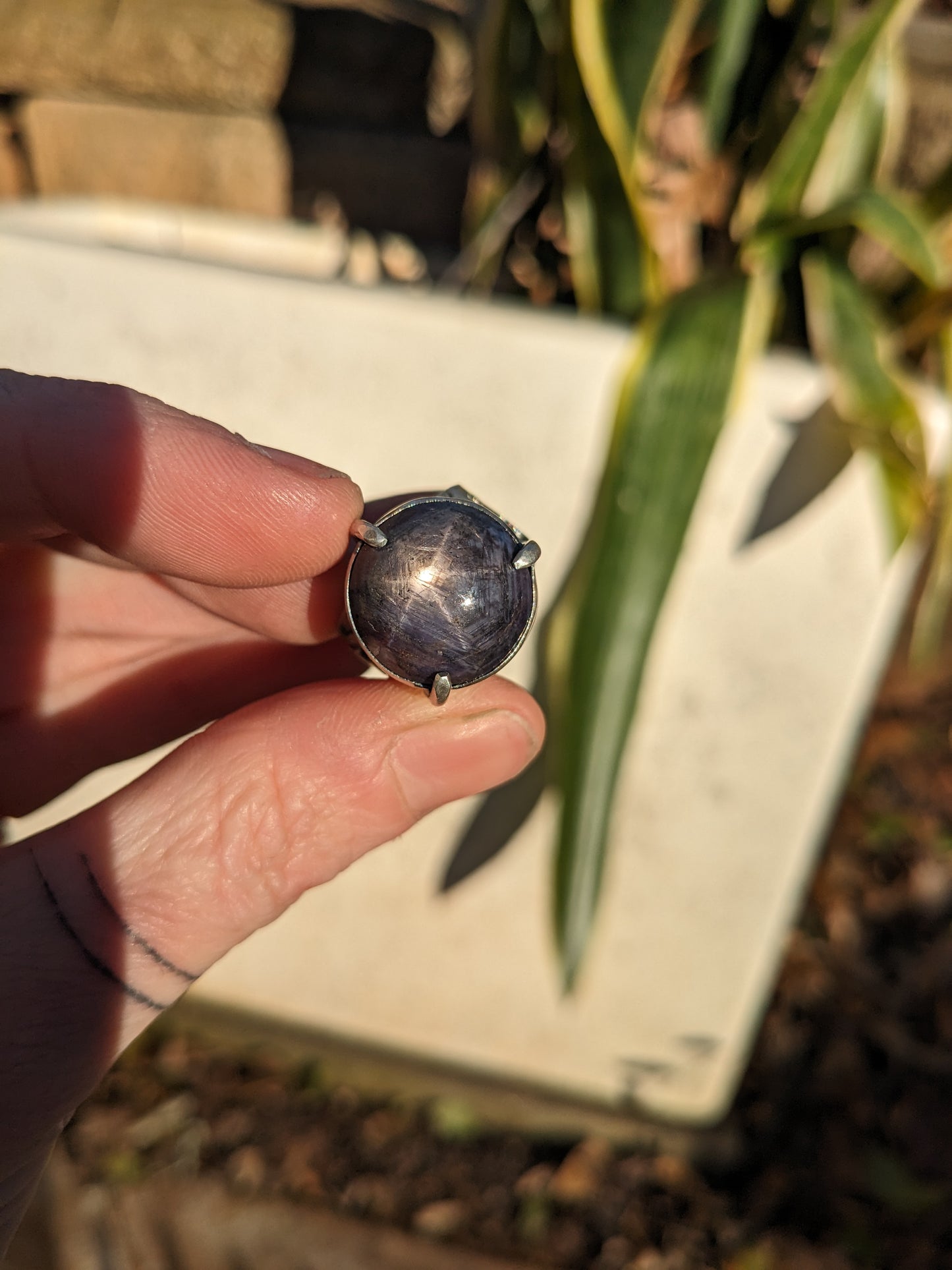 Star ruby and waves ring