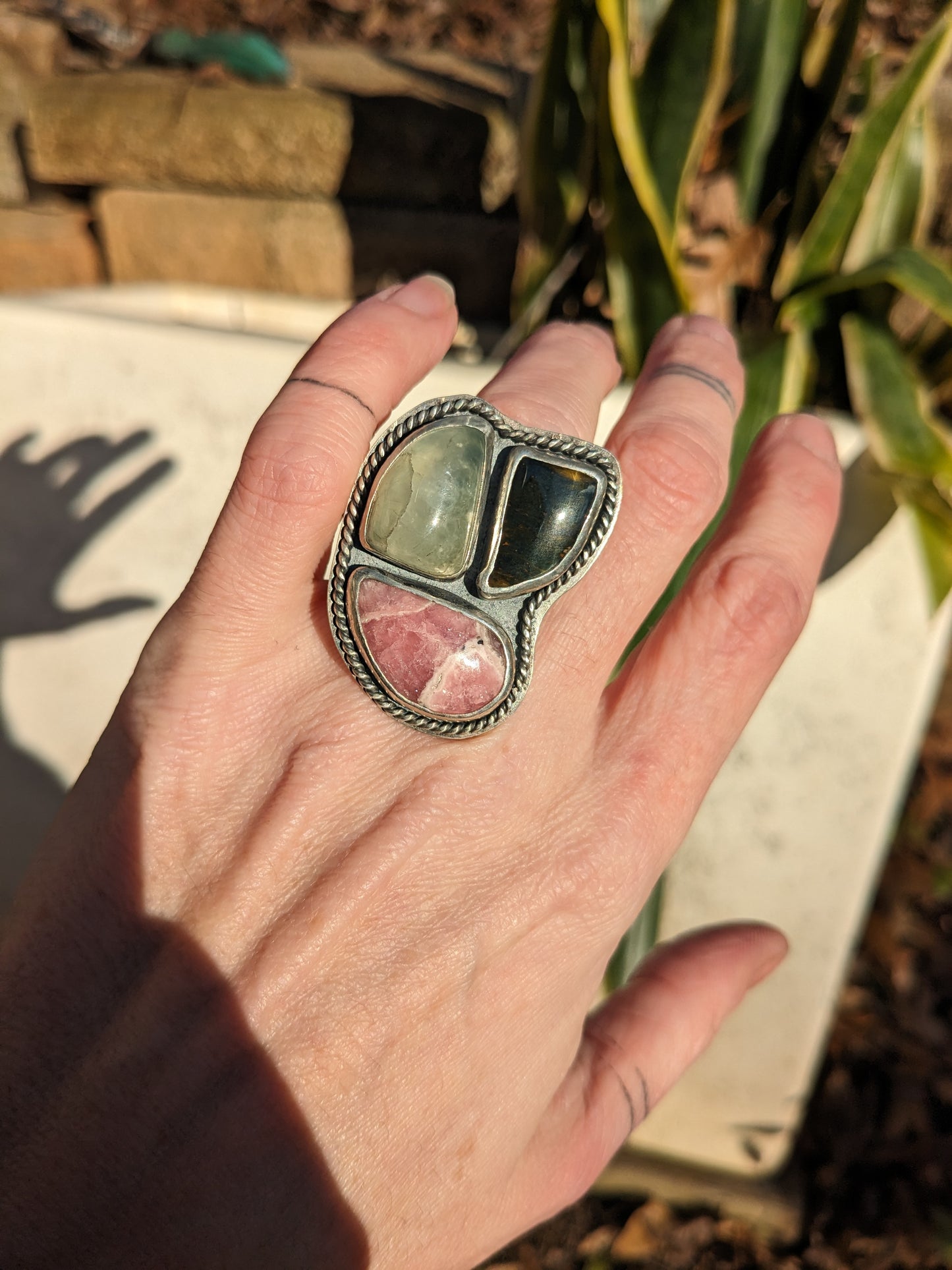 Rhodochrosite, prehnite, and hawks eye ring